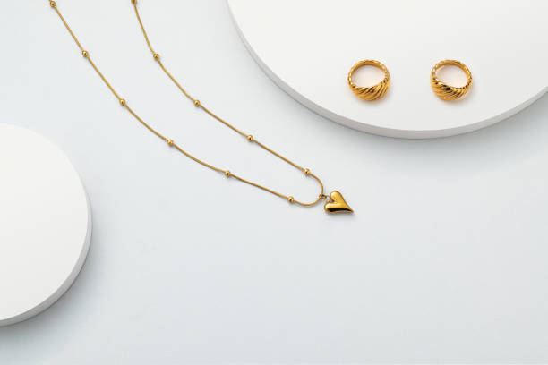 istock Gold necklace jewelry on white background 1491165267