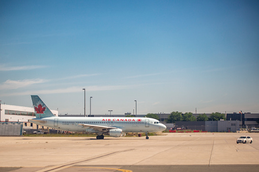 Air Canada Airbus A320-214 aircraft with registration C-FPWE parked at Toronto Lester B. Pearson International Airport in June 2022.