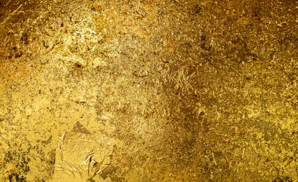 istock Golden painted concrete wall background. Shiny gold foil abstract texture 1491167454