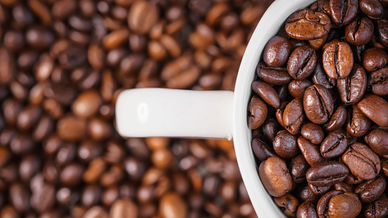 Roasted coffee beans on the background