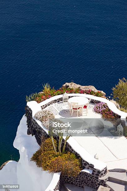 Terrace On The Cliff In Oia Santorini Island Stock Photo - Download Image Now - Aegean Sea, Architecture, Awe