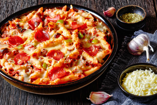 istock Pizza Casserole of pasta, beef, pepperoni, cheese 1491172861