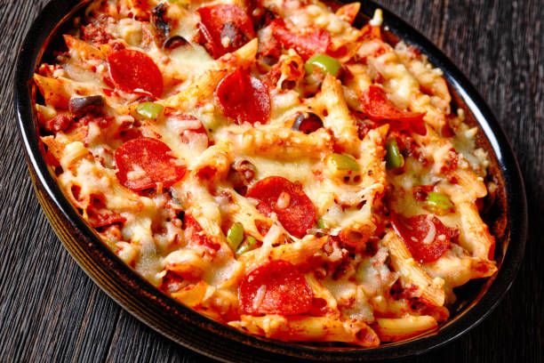 istock Pizza Casserole of pasta, beef, pepperoni, cheese 1491172971