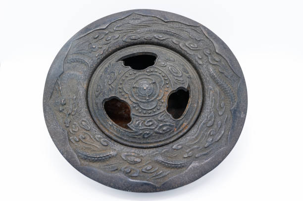 An intricately decorated cast iron bowl, used as an incense holder and ashtray in olden times of Japan. Famously made in Iwate Prefecture.