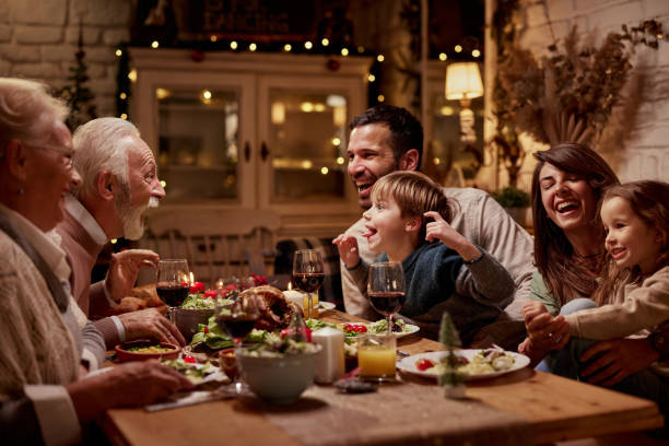 istock Happy multi-generation family having fun during a meal at dining table. 1491174760