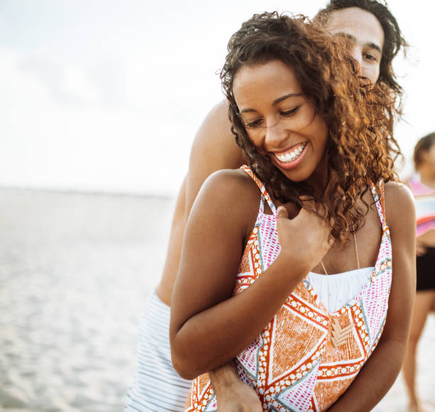 istock happiness african couple at the seaside 1491176152