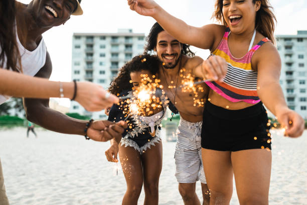 istock friends celebrate at the beach 1491176626