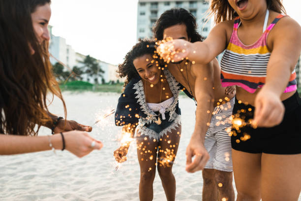 istock friends celebrate at the beach 1491176656