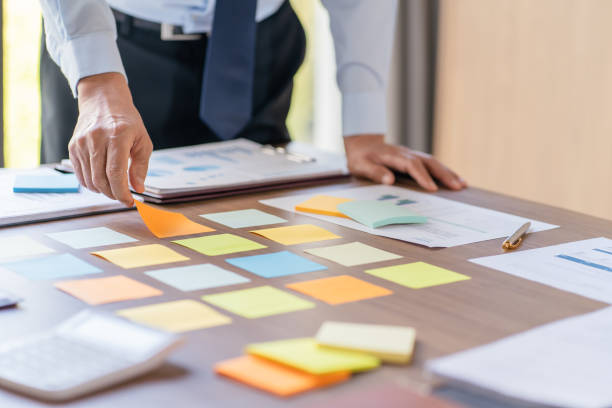 istock Business People brainstorming Meeting Design Ideas use post it notes to share idea professional investor start up project business brainstorming planning in office 1491179534