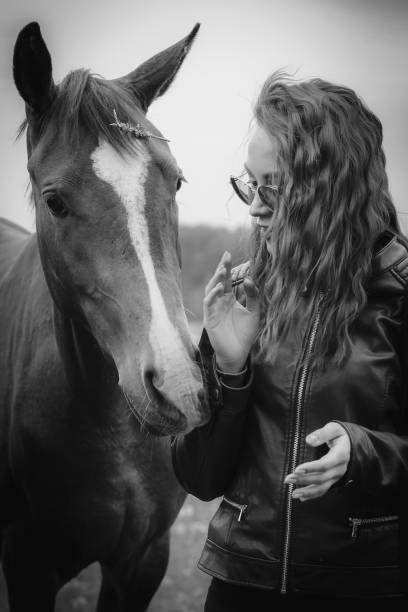 istock A girl and a horse 1491184908