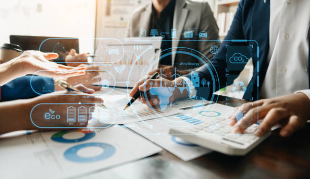 istock Business team working virtual modern smartphone to reduce CO2 emissions carbon footprint climate change to limit global warming.Sustainable development and green business concept. at office 1491184949