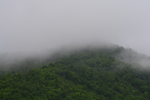 Mountain landscape with fog in Giffoni Valle Piana,Southern Italy,May 15,2023.