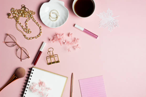 istock Women accessories with notebook over the pink background. 1491189353