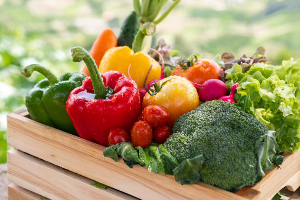 istock Wooden crate filled with fresh organic vegetables 1491191479