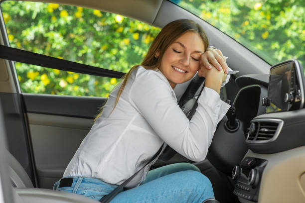 istock Woman enjoying in new car 1491192428