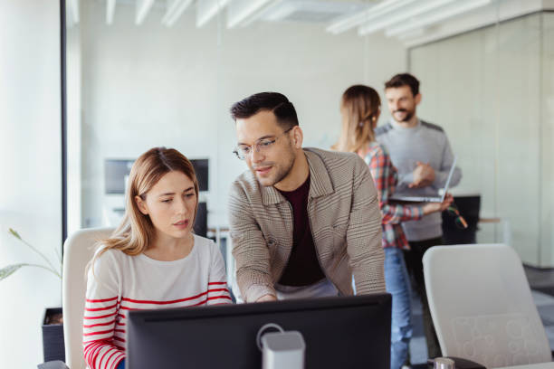 istock Group of Young Coworkers Working 1491193212