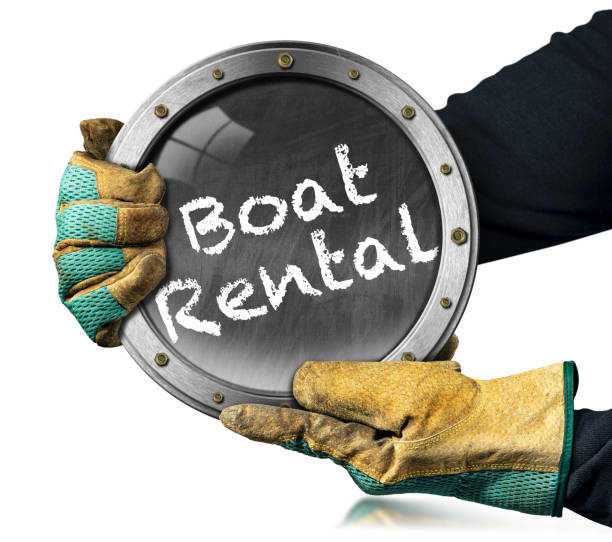 istock Gloved Hands Holding a Blackboard with text Boat Rental 1491198845
