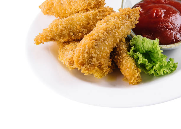 istock Homemade chicken nuggets with ketchup isolated 1491199329