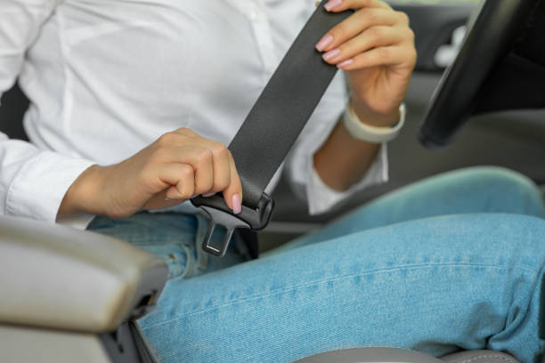istock Putting on safety seatbelt 1491199924