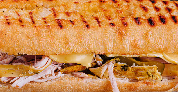 istock Big sandwich with chicken close up background 1491199952