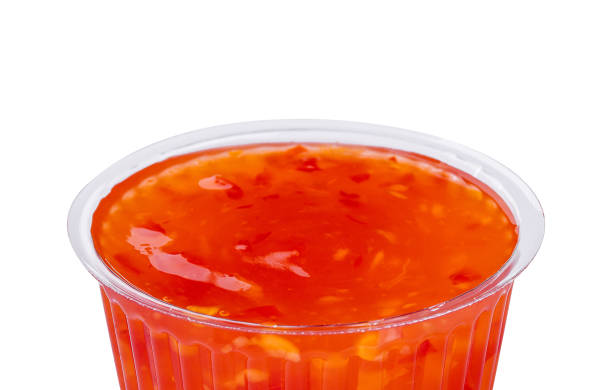 istock red sweet and sour sauce isolated on white 1491201192