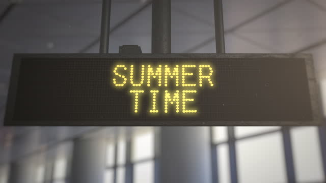 Summer Time on information table of airport