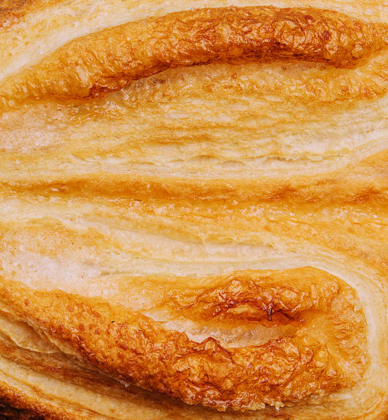 Puff pastry cookies close up background
