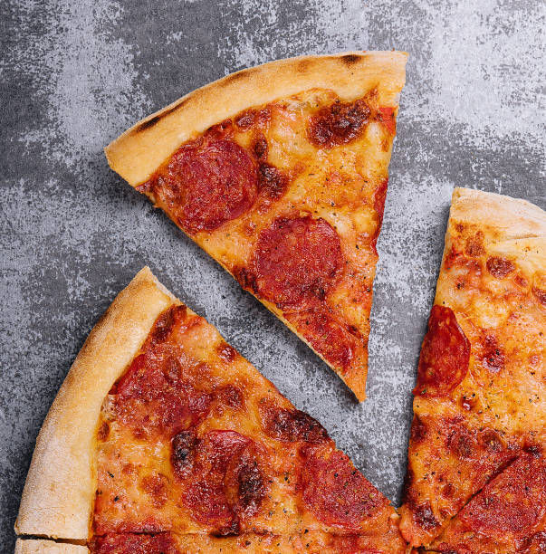 istock top view of hot pepperoni pizza on stone 1491202514