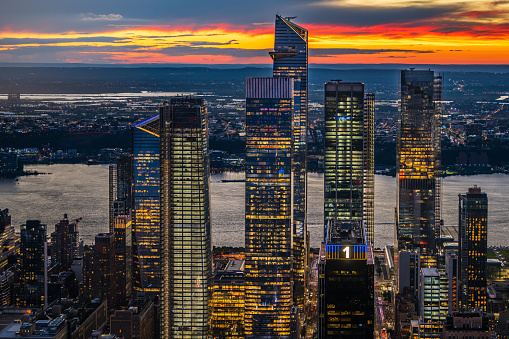A red dusk over the illuminated Hudson Yards in New York City.