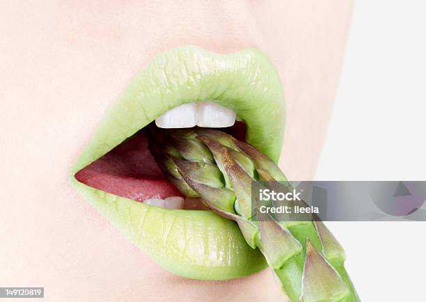 Asparagus Stock Photo - Download Image Now - Asparagus, Eating, Biting