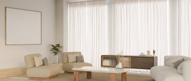 istock Modern white elegance living room with couch, coffee table, white sheer curtains 1491210144