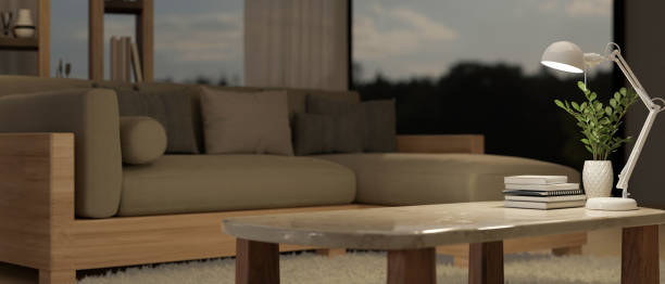 istock Copy space on a coffee table in modern and comfortable living room. close-up image. 1491210360