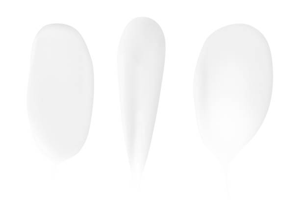 istock A set of different strokes of white cream on a white background. 1491211266