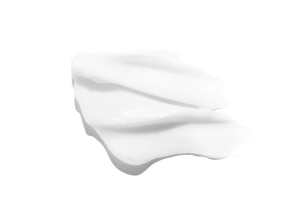 istock A smear of white cream on a white background. 1491211474