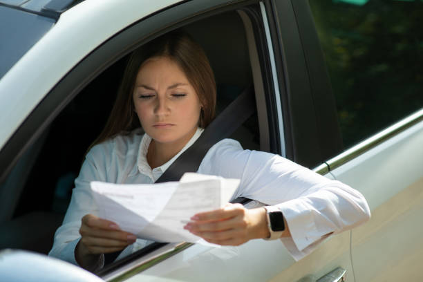 Upset young woman Upset young woman traffic fine stock pictures, royalty-free photos & images