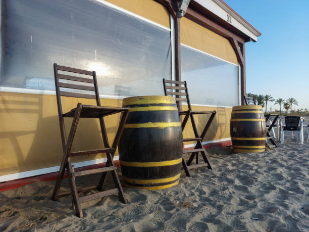 wooden barrels in a beach bar