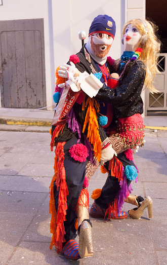 Montanchez, Spain - February 18, 2023: The Jurramacho Carnival of Montanchez. Participant dancing with a life size doll