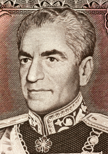 Reza Shah Pahlavi (1878-1844) on 20 Rials 1974 Banknote from Iran. Shah of the Imperial State of Iran during 1925-1841. Less than 30% of the banknote is visible.