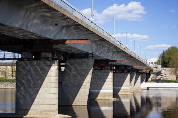 istock Bridge over river. The structure of the bridge. Reinforced concrete bridge bottom view. 1491216154