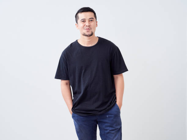 istock Portrait of handsome young man on light background 1491217533