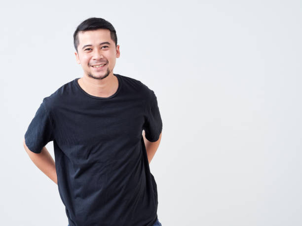 istock Portrait of handsome young man on light background 1491217578