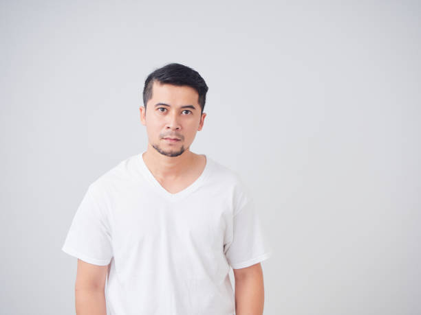 istock Portrait of handsome young man on light background 1491217610
