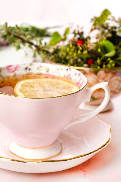 istock Tea with a lemon slice in a porcelain cup 1491223523