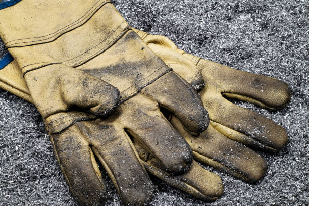istock A pair of rubber gloves, placed on aluminum scrap dust 1491234441