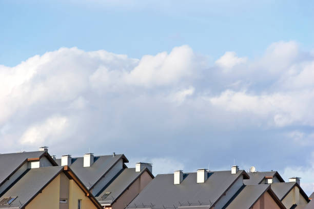 istock Rowhouse Roofs Panorama Rooftops, Large Detailed Horizontal Panoramic Blue Summer Sky Cloudscape, White Clouds, Row House Apartments, Modern Condos Rooftop Group 1491237803