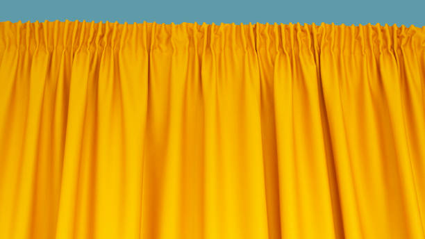 istock Closed yellow drapes with satin velvet light effect on blue backdrop 1491237929
