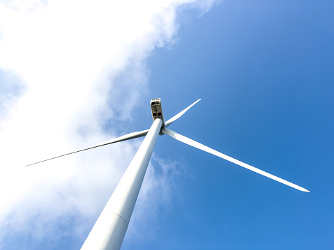 Wind turbine low viewing angle on a sunny day