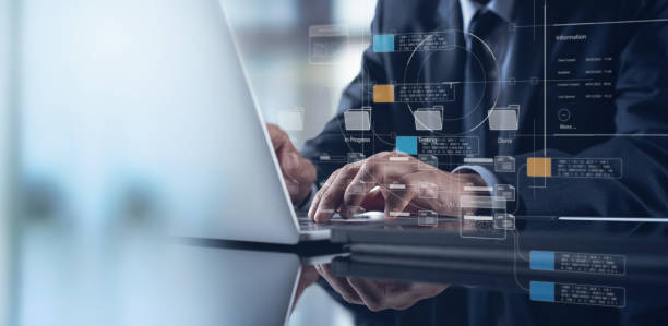 istock Document management system DMS, Enterprise content management, Businessman working on laptop computer with digital document, managing files data, paperless workflow, data search, cloud technology 1491239175