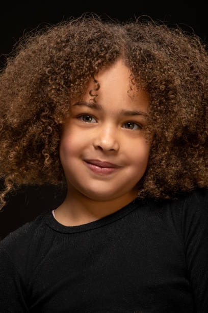 istock Beautiful young black girl posing for studio portrait 1491246628