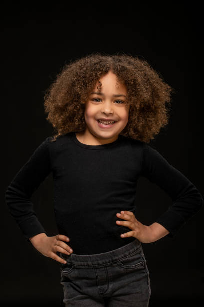 istock Beautiful young black girl posing for studio portrait 1491246635